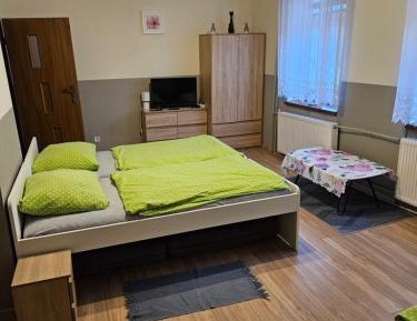 Quadruple Room with Private Bathroom