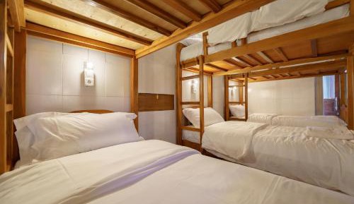 Single Bed in Dormitory Room