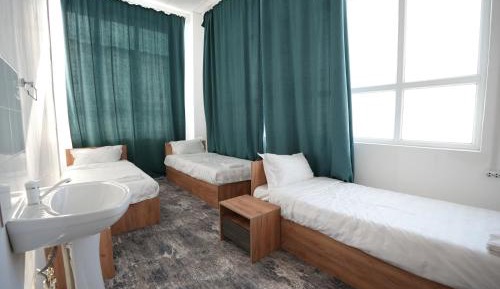 Single Bed in Dormitory Room