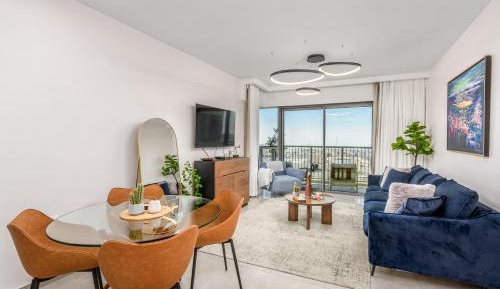 One-Bedroom Apartment with Balcony and City View