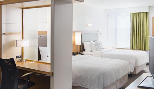 Studio with Two Queen Beds and One Sofa Bed