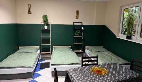 Quadruple Room with Private Bathroom
