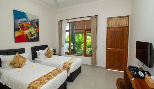 Deluxe Twin Room with Balcony and Garden View