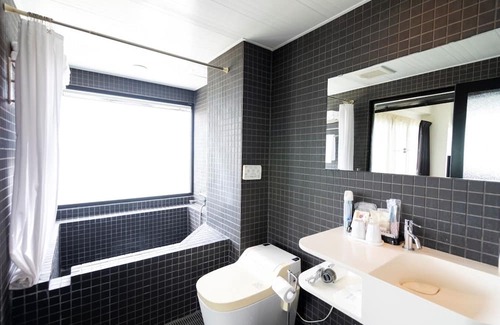 Imadomari House | 202 Sunset Guest room with openair bath Relax / Kunigami-gun Okinawa