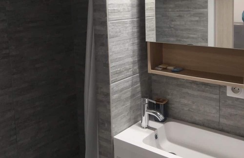 Port District Apartment | Seaside studio with swimming pool.