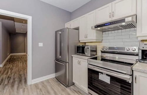 Pickering House | Lower flat with full access to lower patio and backyard , close to the beach .