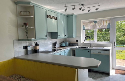 Taunton House | Beautiful bungalow with a sauna, hot tub and games, close to town and walks