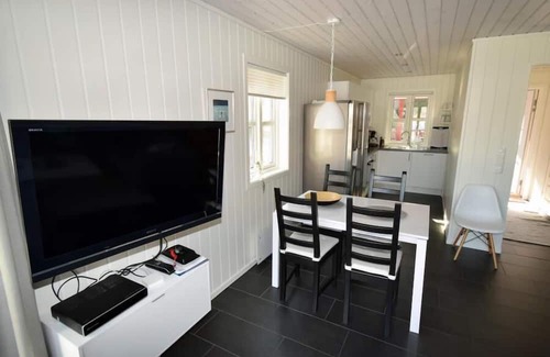 Lindesnes House | Holiday home 'Furuholmen Brygge 7', Furuholmen peninsula near Lindesnes, southern Norway, up to 7 people possible, e.g. 4 adults and 3-4 kids, 4 bedrooms, 2 shower-bathrooms, modern equipment, terrace and boat mooring in front of the house on the .