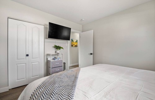 Northeast Edmonton House | Unique stay with retro arcade, free coffee/tea, and a spacious backyard patio