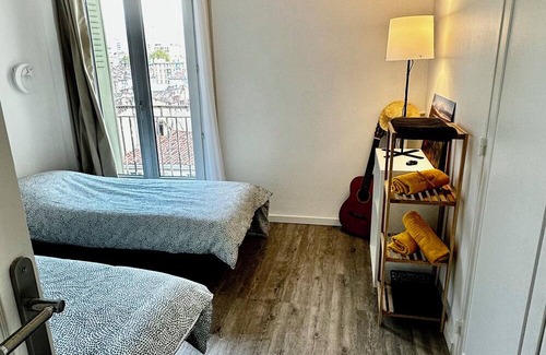 4th Arrondissement Apartment | Charming Cocoon Urban rooftop view