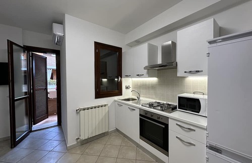Zona XXX Castel Fusano Apartment | Vrbo Property