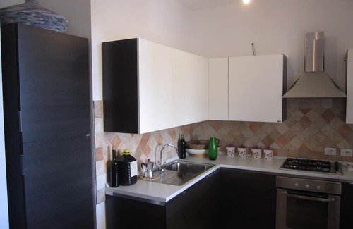 Siniscola House | Holiday Home 'Capo Comino A Due Passi Dal Mare' with Sea View, Private Terrace and Private Garden