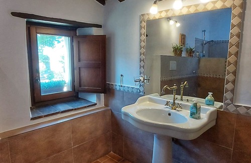 Penna San Giovanni House | San Isidore, a meticulously restored historic Italian home with a stunning pool.