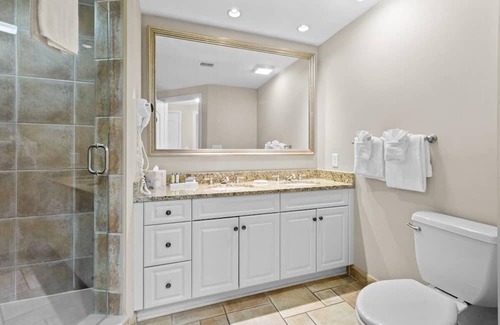 Windy Hill House | Aqua Escape: Oceanfront 2BR Condo with King & Queen Beds