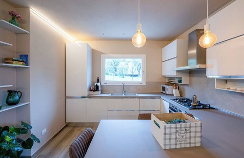 Salo Apartment | New apartment with garden and parking in Salò