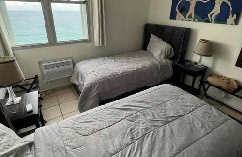La Pared House | 15th Floor Beachfront 2 Bedroom Condo with Pool & Ocean View at Sandy Hills