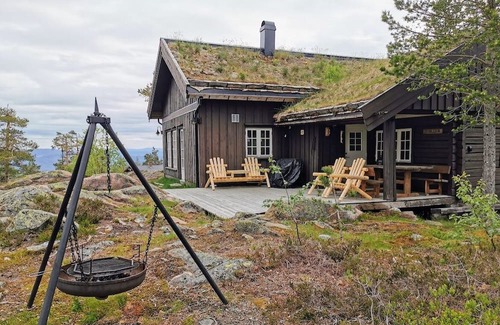 Flesberg Cabin | Moderne, lun og koselig tømmerhytte på Blefjell