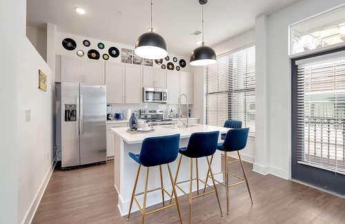 Rolling Mill Hill Apartment | Groovy Nashville: Parking, Pool, Gym, Terrace. So close to Broadway & Downtown!
