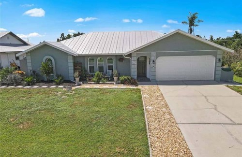 Harbour Heights House | Paradise Awaits. Beautiful Home with Pool located on a canal with dock