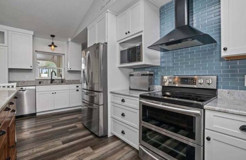 Harbour Heights House | Paradise Awaits. Beautiful Home with Pool located on a canal with dock