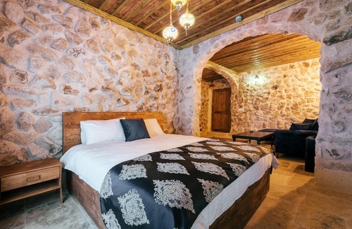 Uchisar House | Authentic Room in Cappadocia Tughan Stone House