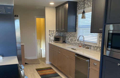 Everett House | Beautiful three bedroom, two bath newly renovated brick home with 2 car garage.