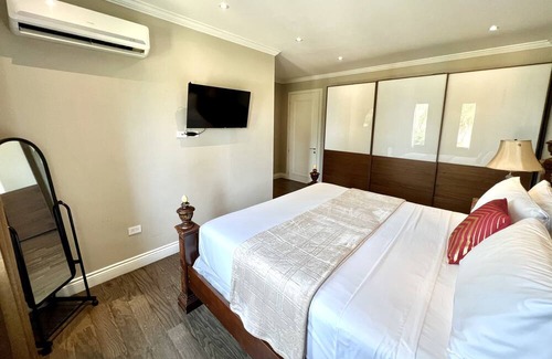 Port of Spain Apartment | Pandora Luxury Home In POS: King Guest Room