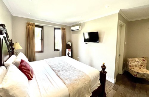 Port of Spain Apartment | Pandora Luxury Home In POS: King Guest Room
