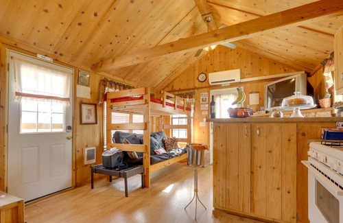 Logansport Cabin | Riverfront ‘Portobello Cabin’ w/ Hot Tub & Canoe!