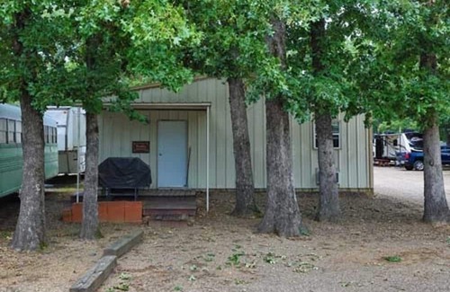 Hugo Cabin | Shady Oaks RV Resort 3 Bed Bunk House Cabin