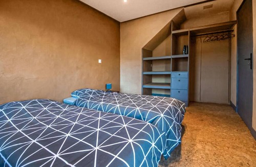 Marcoux Apartment | This beautiful and modern vacation home welcomes you with a breathtaking mountain view.