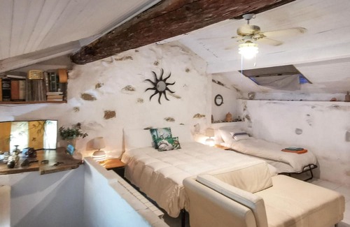 Latte Apartment | With a fantastic view of the sea and the coast, this cozy vacation apartment welcomes you to a green