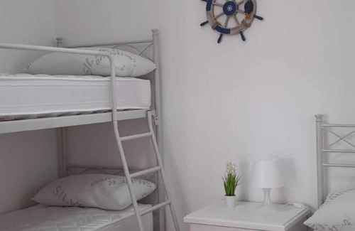 Marina di Lizzano Apartment | Apartment "Villa Rifla Attico" with Sea View, Private Terrace & Wi-Fi
