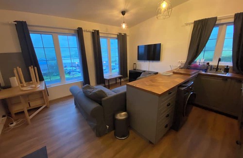 Myrdalshreppur Apartment | Panorama Vík - Charming 2-bedroom apartment in Vík with stunning views.