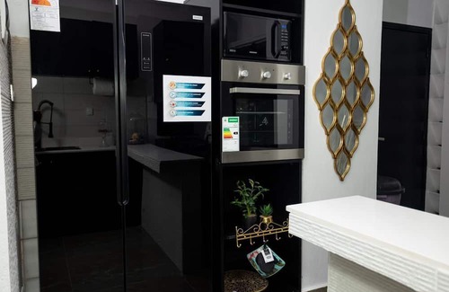 Presidence Apartment | Cozy 1-bedroom flat in downtown Plateau-Abidjan, where nature and serenity meet.