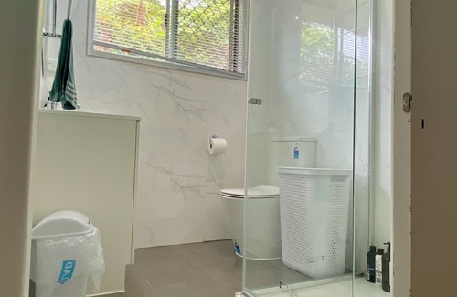 Centenary Heights Apartment | Modern Studio Room Retreat with a reverse Aircon