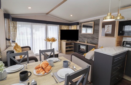 Hopton Cottage | STAG LODGE, CARAVAN 70, with pool in Belton, Norfolk