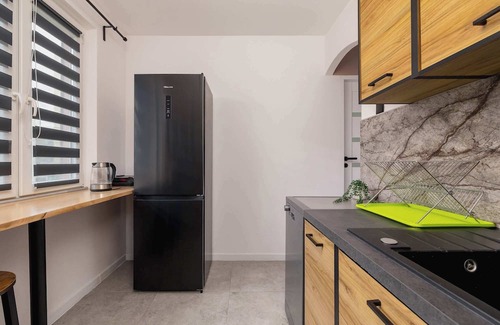 Katowice Apartment | Ossowskiego 28 Katowice | Blue and Green Apartment with Balcony