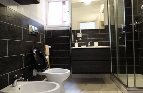 Quartiere XXIV Don Bosco Apartment | Apartment 'Cominio 56 - Near Metro A' with Balcony and Air Conditioning