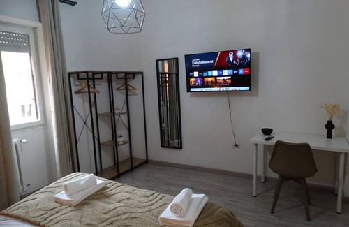 Quartiere XXIV Don Bosco Apartment | Apartment 'Cominio 56 - Near Metro A' with Balcony and Air Conditioning