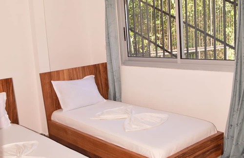 Kribi Hotel | 🛏️ 🛏️ Communicating Rooms - Lobé, Ntem, Kienje & Dja at Gîtes de Kribi