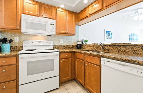 Avon By The Sea Condo | Coastal Comfort Steps from Cocoa Beach Pier W/Heated Pool, BBQ Grills & Private Balcony