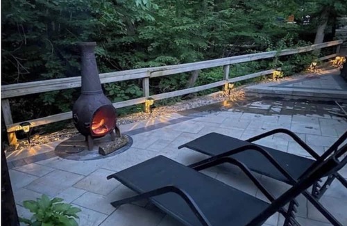 Monroe Cabin | European inspired 2-bedroom cabin with a brooke in back patio, in Monroe, NY.