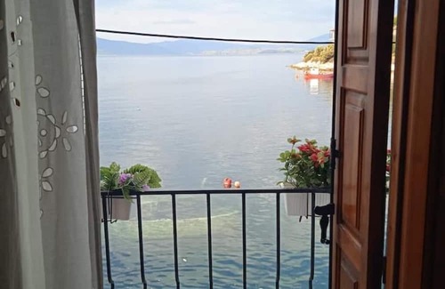 Trikeri House | Seaside Tower House: A Traditional Retreat with Breathtaking Views