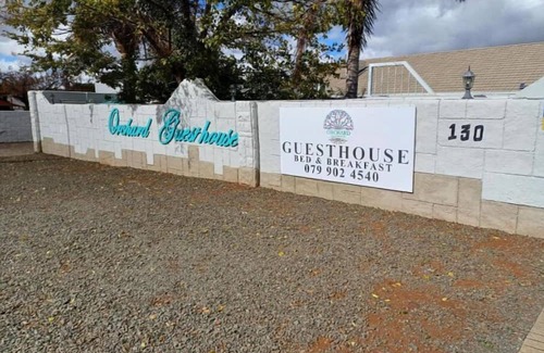Fichardt Park Apartment | Orchard Guesthouse Double Room with Pool View