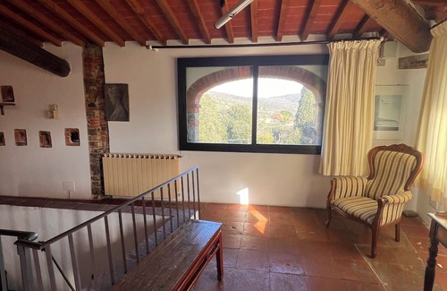 Pieve a Presciano Apartment | Penthouse with large windows and frescoes in hamlet with pool use