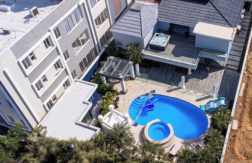 Santiago de los Caballeros Villa | Pastel Room Chef & Pool in the Mansion