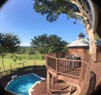 Bullet Tree Falls Villa | Exotic High End Unique Off-The-Grid Treehouse steps away from the Mopan River