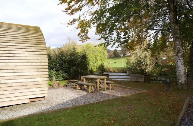 A premium wigwam with hot tub that sleeps 4 guests, 2 adults are included.