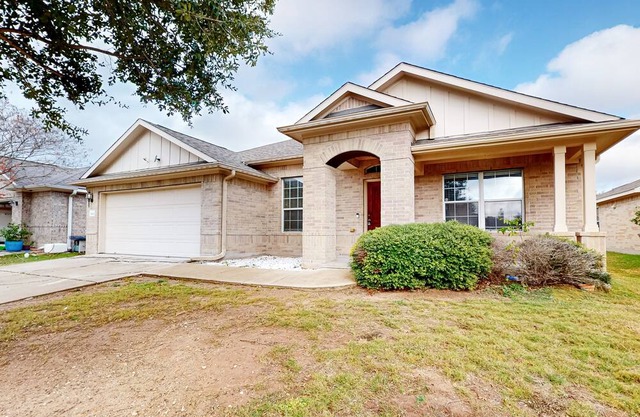 Northeast Austin home with enclosed yard, single-story interior, AC, & W/D